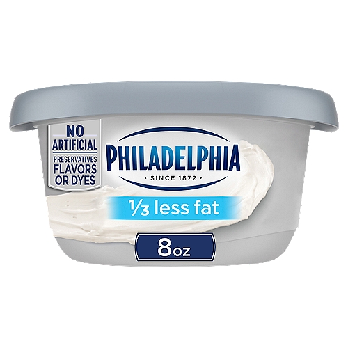 Philadelphia Reduced Fat Cream Cheese Spread with 1/3 Less Fat, 8 oz Tub
Philadelphia 1/3 Less Fat Cream Cheese Spread is made with fresh milk and cream. Our spreadable cream cheese spread has 1/3 less fat than regular cream cheese; is made with no artificial preservatives, flavors or dyes. With a cool, creamy texture, it is perfect for spreading on your warm, toasty morning bagel. Serve it at all your holiday brunch occasions. Each 8 oz. plain cream cheese spread tub is resealable to lock in flavor.

• One 8 oz. tub of Philadelphia 1/3 Less Fat Cream Cheese Spread
• Bring joy to your holiday season breakfasts with Philadelphia 1/3 Less Fat Cream Cheese Spread
• Serve Philadelphia 1/3 Less Fat Cream Cheese Spread at all your holiday brunch gatherings
• Philadelphia 1/3 Less Fat Cream Cheese Spread has no artificial preservatives, flavors or dyes
• 1/3 less fat than regular cream cheese spread
• Our lower fat cream cheese spread is made with fresh milk and real cream
• Made with milk that's fresh from the farm to our creamery in just 6 days
• This 1/3 less fat cream cheese spread is perfect for spreading on your morning bagel
• Keep refrigerated in resealable tub
• Certified kosher cream cheese