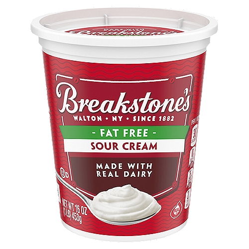 Breakstone's Fat Free Sour Cream, 16 oz Tub
Breakstone's Fat Free Sour Cream delivers the classic taste and creamy texture you know and love without the fat. Made from cultured pasteurized Grade A nonfat milk, this delicious sour cream is always a great addition to meals and side dishes. Enjoy fat free sour cream on baked potatoes or as a creamy sandwich topping. Add a dollop to tomato soup or taco pizza, or make a delicious French onion dip for veggies or chips. The convenient resealable 16 ounce tub stores neatly in your refrigerator and keeps this sour cream ready for when a craving hits. Breakstones sour cream is always creamy and deliciously satisfying because Breakstone's has been made with quality, care, and the finest ingredients since 1882.

• One 16 oz. tub of Breakstone's Fat Free Sour Cream
• Breakstone's Fat Free Sour Cream delivers classic sour cream taste and texture without the fat
• Contains cultured pasteurized Grade A nonfat milk
• This sour cream is fat free
• Certified Grade A pasteurized sour cream
• Dollop some creamy sour cream on top of layered nachos or chili, or use it as a chip dip
• Packaged in a resealable tub for lasting freshness in the fridge
• Certified Kosher sour cream