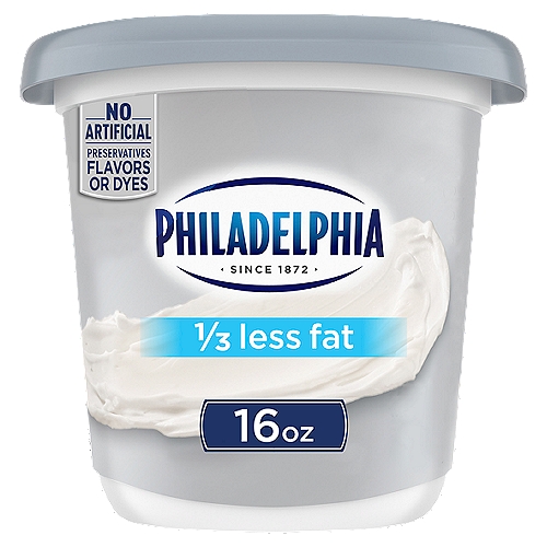 Philadelphia 1/3 Less Fat Cream Cheese Spread is made with fresh milk and cream. Our spreadable cream cheese spread has 1/3 less fat than regular cream cheese; is made with no artificial preservatives, flavors or dyes. With a cool, creamy texture, it is perfect for spreading on your warm, toasty morning bagel. Serve it at all your holiday brunch occasions. Each 16 oz. plain cream cheese tub is resealable to lock in flavor.nn• One 16 oz. tub of Philadelphia 1/3 Less Fat Cream Cheese Spreadn• Bring joy to your holiday season breakfasts with Philadelphia 1/3 Less Fat Cream Cheese Spreadn• Serve Philadelphia 1/3 Less Fat Cream Cheese Spread at all your holiday brunch gatheringsn• Philadelphia 1/3 Less Fat Cream Cheese Spread has no artificial preservatives, flavors or dyesn• 1/3 less fat than regular cream cheesen• Our lower fat cream cheese spread is made with only fresh milk and real creamn• Made with milk that's fresh from the farm to our creamery in just 6 daysn• This 1/3 less fat cream cheese spread is perfect for spreading on your morning bageln• Keep refrigerated in resealable tubn• Certified kosher cream cheese