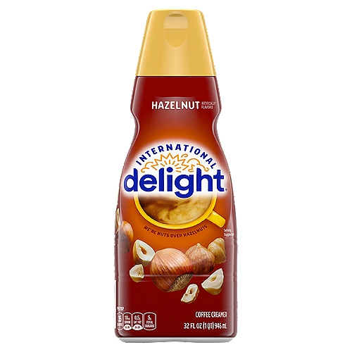 Brimming with smooth, hazelnut flavor, International Delight Hazelnut Coffee Creamer makes your cup of coffee a cause for celebration. This creamer is both gluten- and lactose-free. It makes the perfect addition to any office or home. Surprise your coworkers or family with a bottle, and watch the room light up with delight.nFor over thirty years, International Delight has been making the world a tastier place, one cup of coffee at a time. Our coffee creamers come in over twenty different delicious flavors, including fat- and sugar-free varieties, and we now offer a wide selection of iced coffees, as well. We believe that there's an art to concocting the perfect cup of coffee, and we want every sip you take to be a masterpiece of flavor. Welcome to Creamer Nation.