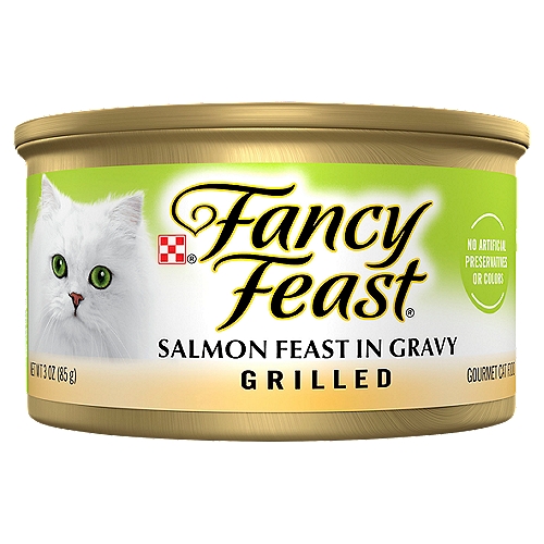 Let Fancy Feast delight your cat with an exceptional mealtime experience every time you open a can of Fancy Feast Grilled Cat Food Salmon in Gravy Cat Food. Crafted in partnership with our expert chefs and nutritionists, this protein-rich, wet food for cats features the irresistible taste of real salmon while delivering 100 percent complete and balanced nourishment. Also included in this flavorful, high-quality soft cat food is a blend of vitamins and minerals to support your cat's whole-body health and a light, savory cat food gravy to tempt their tastebuds. This premium canned cat food recipe is made without artificial colors or preservatives, so you know your cat is getting everything they need and nothing they don't. Show your cat how much you care with a can of Grilled Fancy Feast wet cat food and watch them savor the spellbinding aroma, enticing texture and delectable flavor sensation down to the very last bite.