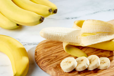 Bunch of Raw Organic Bananas Ready to Eat Stock Photo by esindeniz