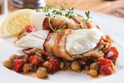 Bacon-Wrapped Haddock over Chickpea Mash