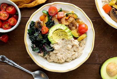 Creamy Cauliflower Breakfast Oats with Vegetables and Avocado