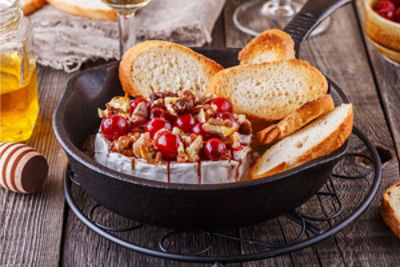 Honey Baked Brie with Cranberries and Walnuts