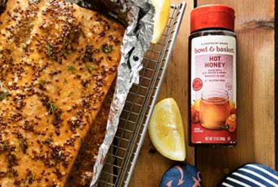 Grilled Salmon next to bottle of hot honey